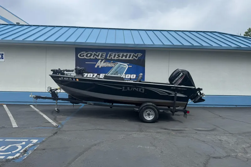 The Image of 2019 Lund 1675 Adventure Sport boat on trailer, parked outside Gone Fishin' Marine. - 1