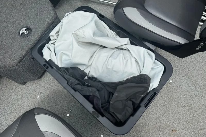 Slide: The Image of Storage compartment in 2019 Lund 1675 Adventure Sport boat with fabric inside. - 17