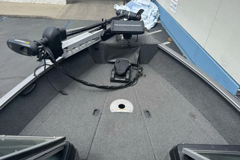 Slide: The Image of 2019 Lund 1675 Adventure Sport boat interior with Humminbird equipment. - 21