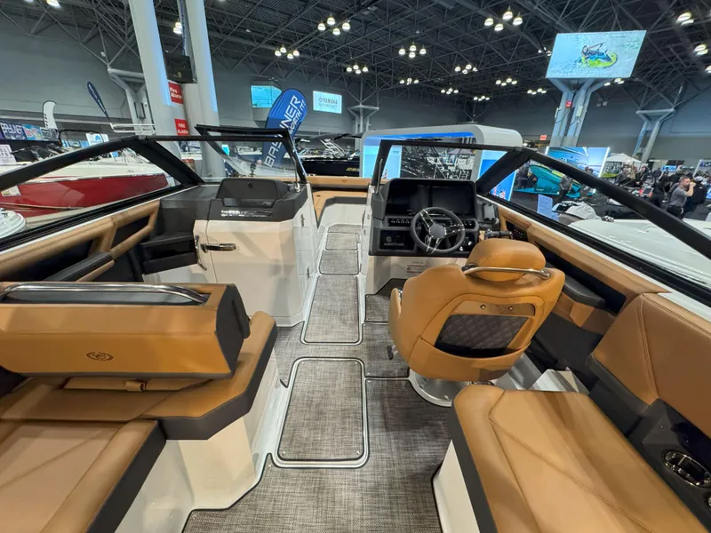 Slide: The Image of 2025 Cobalt R8 Outboard boat interior with luxurious seating and modern dashboard. - 11
