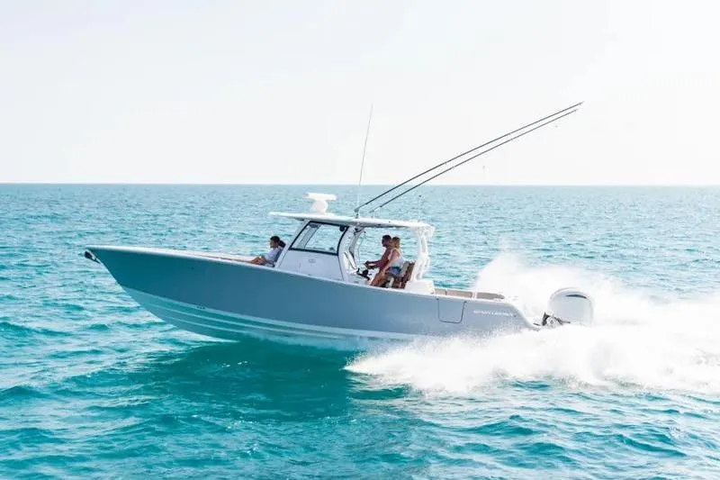 The Image of 2026 Sportsman Open 352 Center Console cruising on open ocean waters. - 1