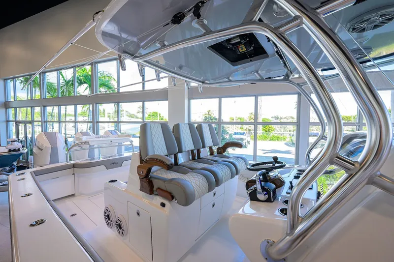 Slide: The Image of Interior view of 2025 Valhalla Boatworks V-37, showcasing luxurious seating and modern helm design. - 15