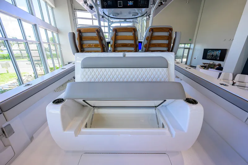 Slide: The Image of 2025 Valhalla Boatworks V-37 interior with luxurious seating and storage compartment. - 20