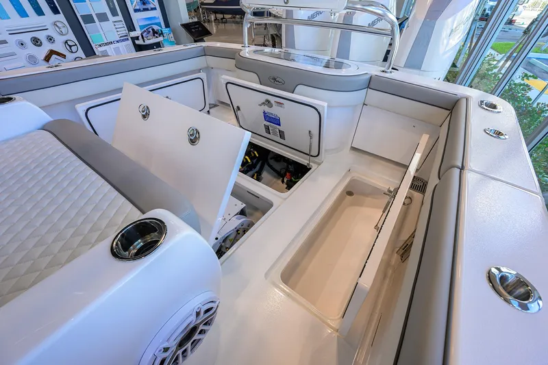 Slide: The Image of 2025 Valhalla Boatworks V-37 interior with open storage compartments and seating. - 23