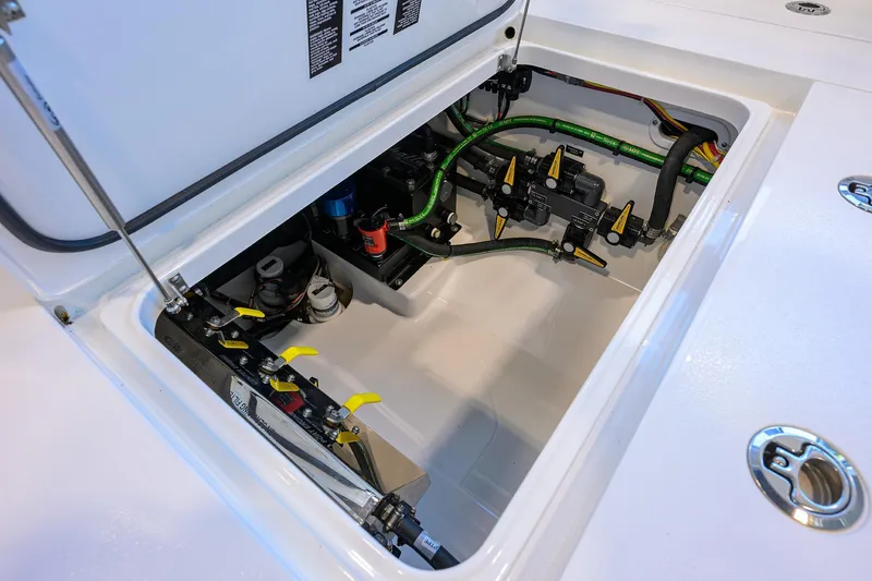 Slide: The Image of 2025 Valhalla Boatworks V-37 engine compartment with visible wiring and components. - 29
