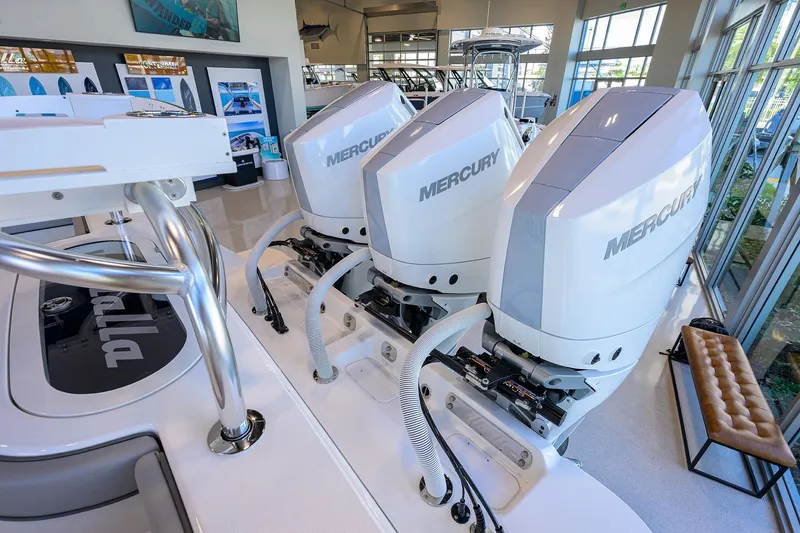 Slide: The Image of 2025 Valhalla Boatworks V-37 with triple Mercury outboard engines in showroom. - 31