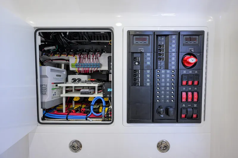 Slide: The Image of Electrical panel and wiring inside a 2025 Valhalla Boatworks V-37. - 34
