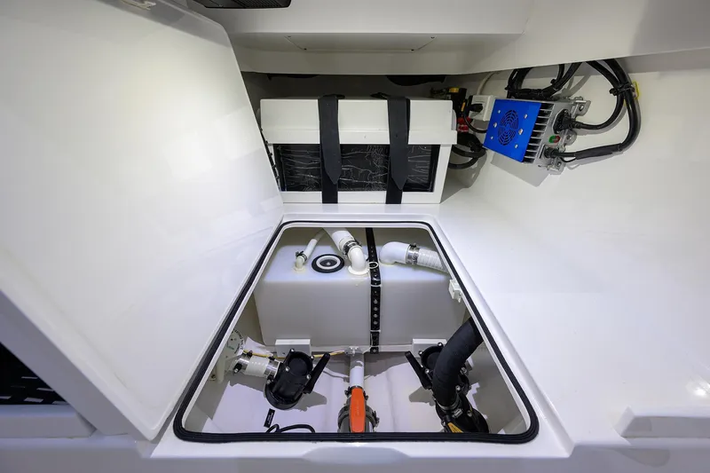 Slide: The Image of 2025 Valhalla Boatworks V-37 interior compartment showcasing advanced electrical and plumbing systems. - 36