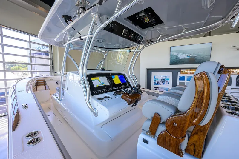 Slide: The Image of 2025 Valhalla Boatworks V-37 interior with advanced navigation system and luxurious seating. - 4