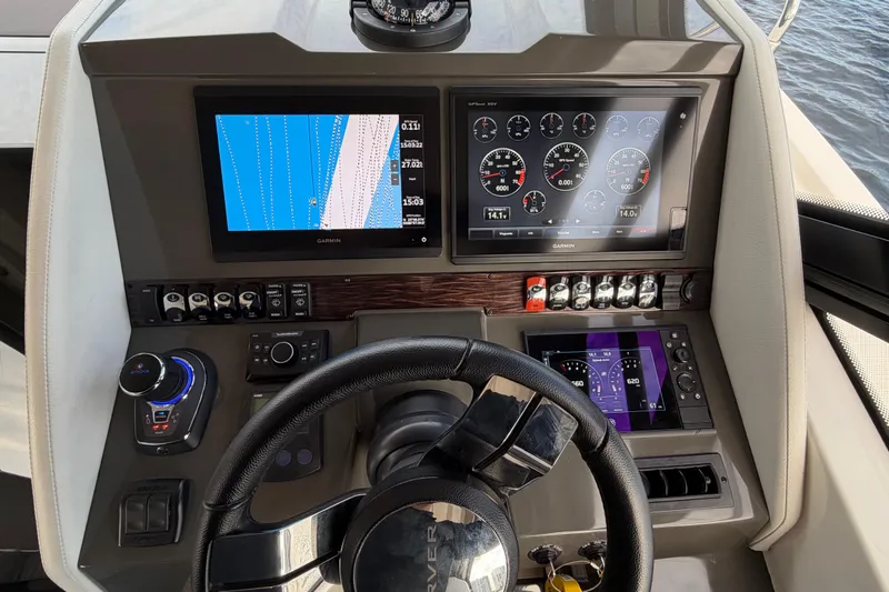 Slide: The Image of 2019 Carver C34 helm with Garmin navigation and control displays. - 4