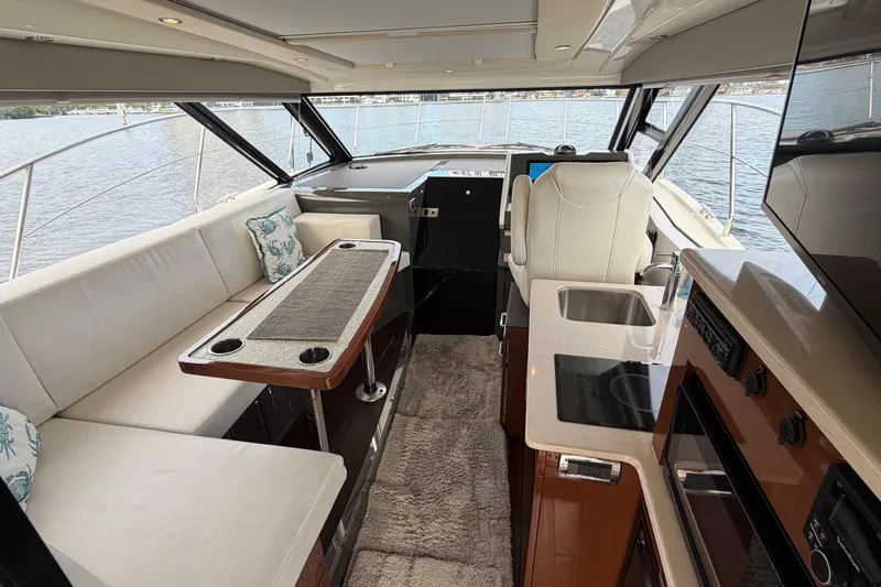 Slide: The Image of Luxurious interior of a 2019 Carver C34 yacht with modern amenities. - 9