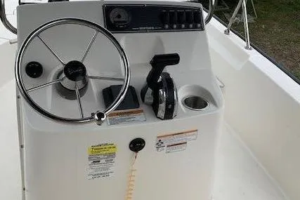 Slide: The Image of Steering console of the 2023 Boston Whaler 170 Montauk. - 19