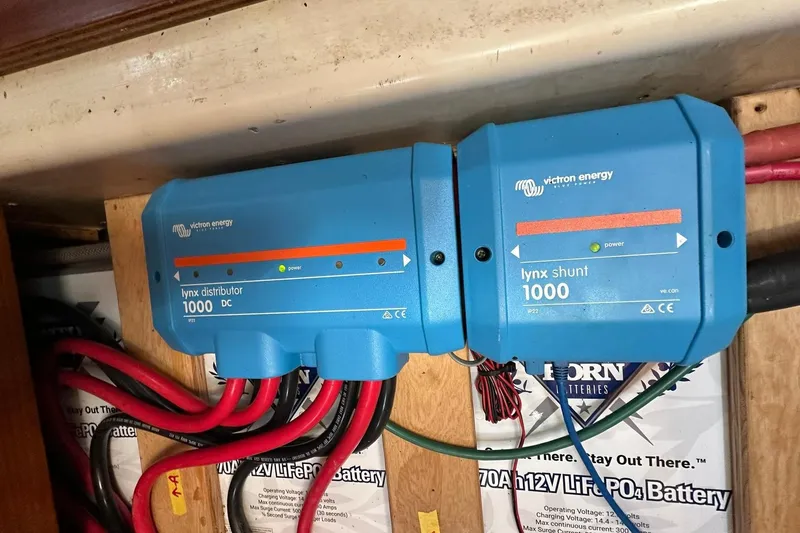 Slide: The Image of Victron Energy Lynx Shunt and Distributor in Beneteau 50 yacht, 2000 model. - 110