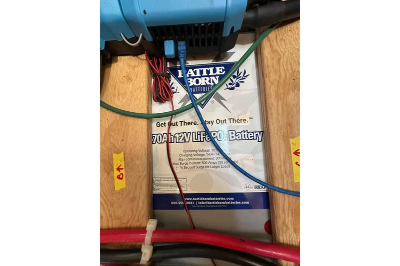 Slide: The Image of Battle Born 12V LiFePO4 battery setup on a 2000 Beneteau 50 yacht. - 111