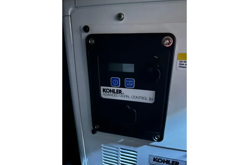 Slide: The Image of Kohler advanced digital control panel on a 2000 Beneteau 50 yacht. - 119