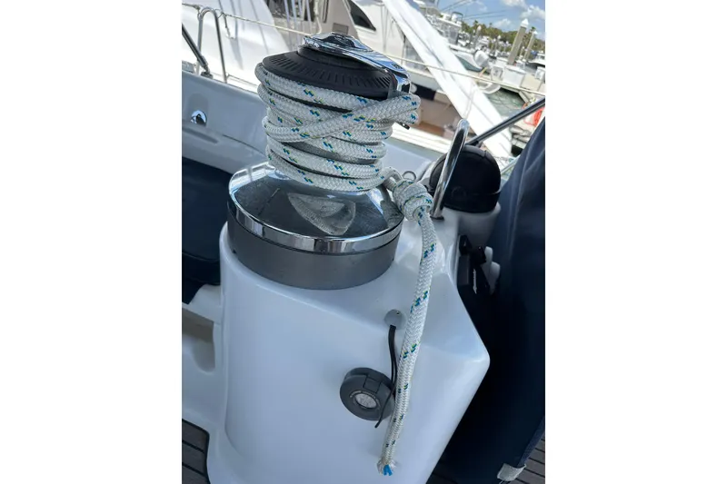 Slide: The Image of Winch with rope on 2000 Beneteau 50 sailboat deck. - 125