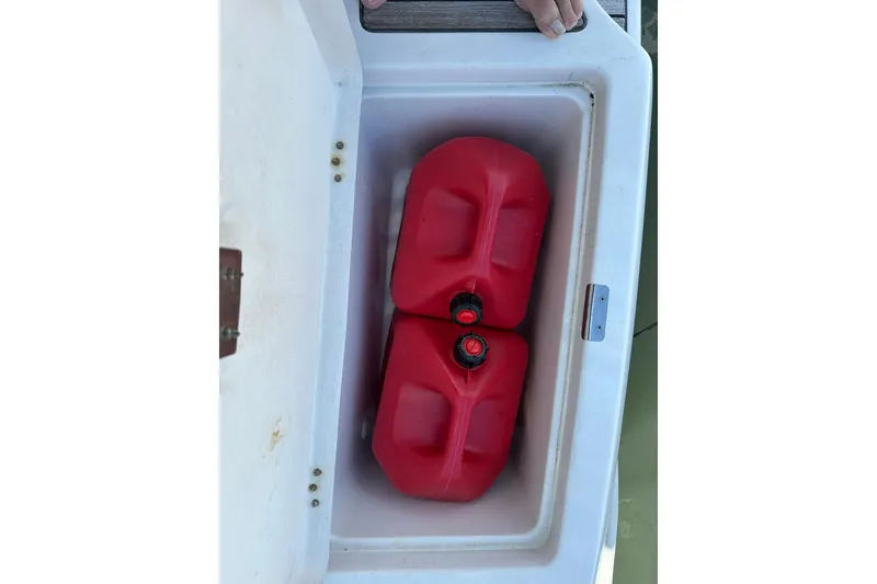 Slide: The Image of Red fuel containers in Beneteau 50 yacht storage compartment, 2000 model. - 127