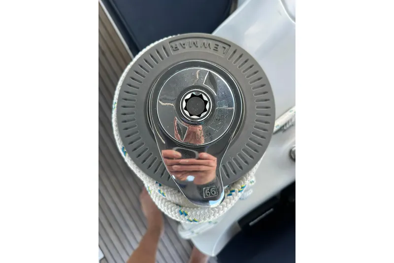 Slide: The Image of Close-up of a Lewmar winch on a 2000 Beneteau 50 sailboat deck. - 13