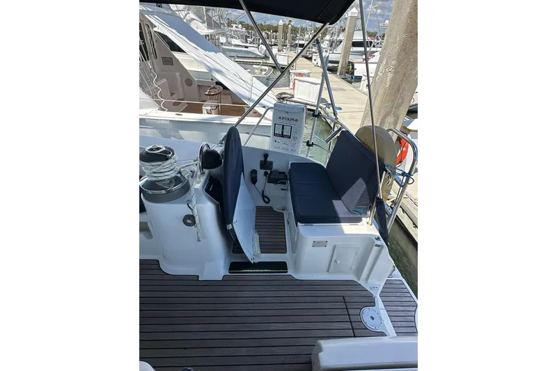 Slide: The Image of Cockpit of a 2000 Beneteau 50 sailboat with seating and winch. - 15
