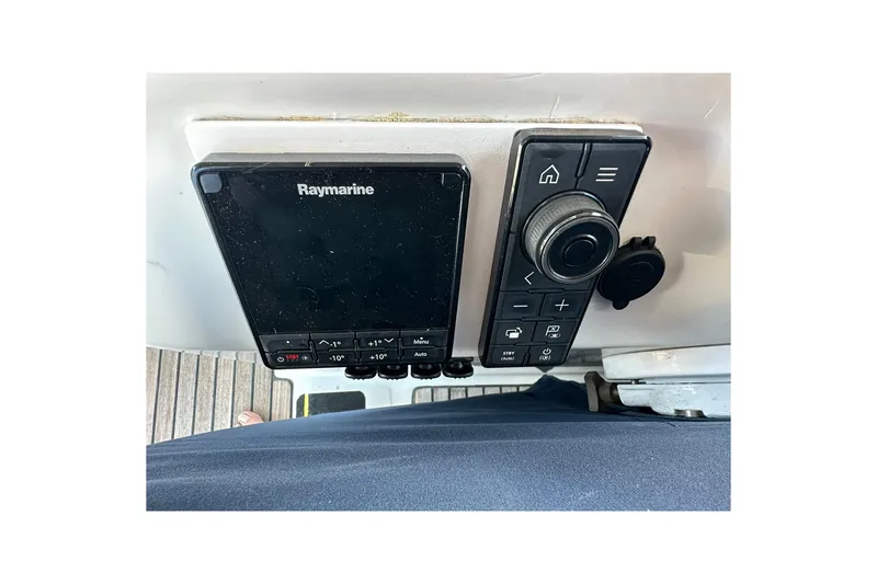 Slide: The Image of Raymarine navigation system on a 2000 Beneteau 50 yacht control panel. - 20