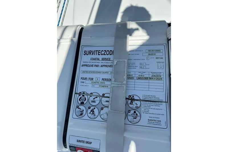 Slide: The Image of Safety equipment on a 2000 Beneteau 50 yacht, featuring a SurvitecZodiac liferaft. - 42
