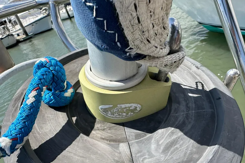 Slide: The Image of Close-up of a Beneteau 50 sailboat's mast base with ropes, 2000 model. - 54