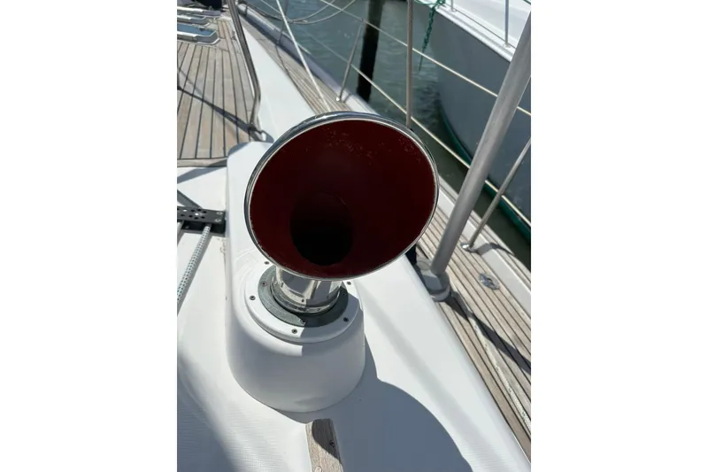 Slide: The Image of Deck vent on a 2000 Beneteau 50 sailboat, showcasing marine hardware details. - 57