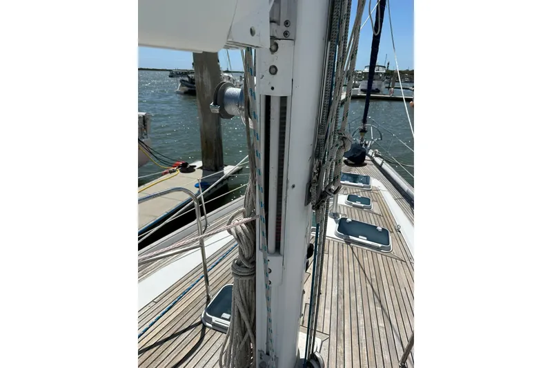Slide: The Image of Deck view of a 2000 Beneteau 50 sailboat, showcasing mast and rigging details. - 59