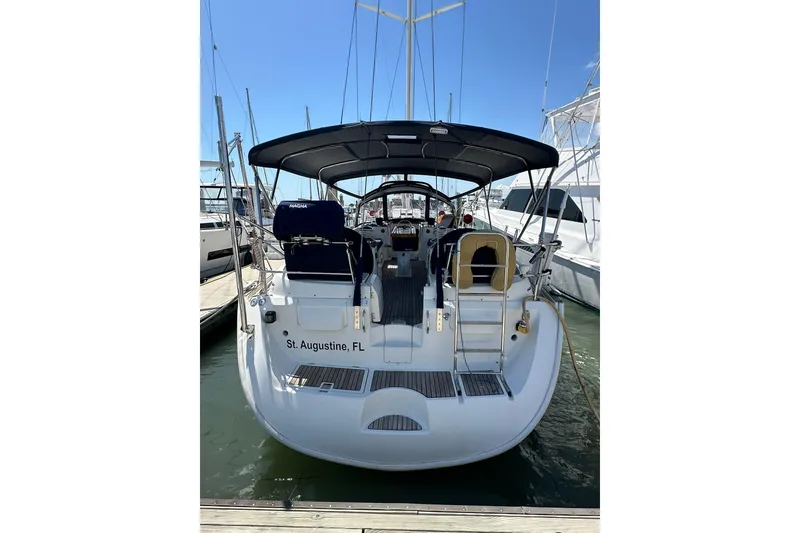 Slide: The Image of 2000 Beneteau 50 sailboat docked in St. Augustine, FL marina. - 6