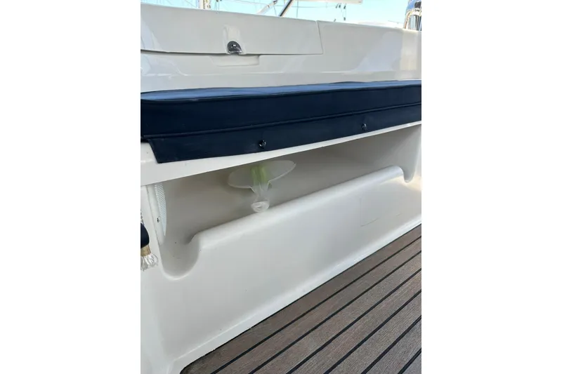Slide: The Image of Beneteau 50 yacht deck detail, featuring seating and storage, 2000 model. - 61