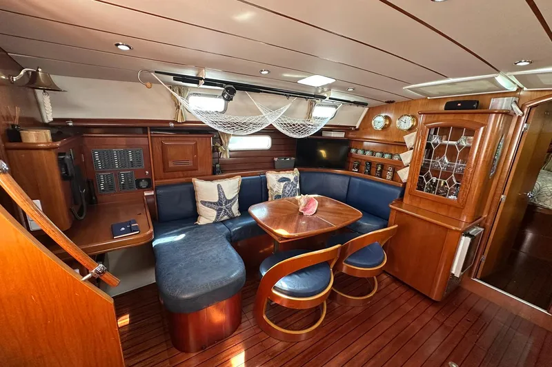 Slide: The Image of Luxurious interior of a 2000 Beneteau 50 yacht with elegant wood finish. - 67