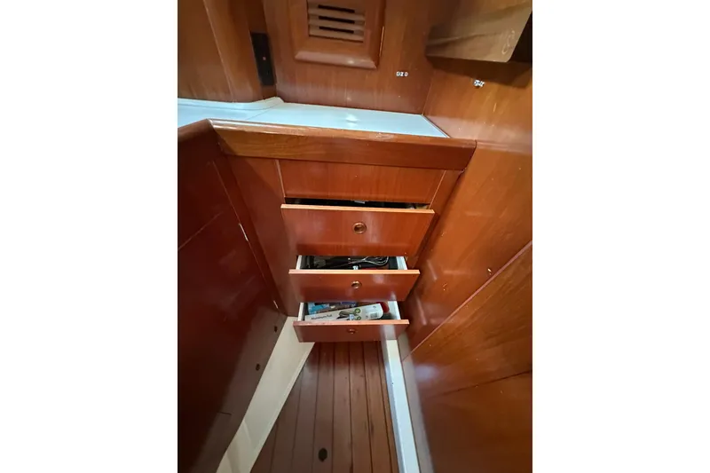 Slide: The Image of Wooden interior drawers on a 2000 Beneteau 50 yacht. - 88
