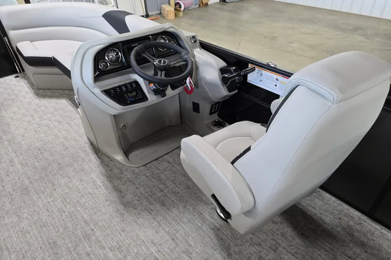 Slide: The Image of Interior of 2026 Trifecta 24RF LE 2.75 pontoon boat with modern helm and seating. - 10