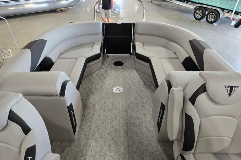 Slide: The Image of Luxurious interior of 2026 Trifecta 24RF LE 2.75 pontoon boat with plush seating. - 12