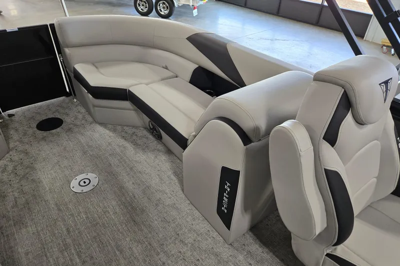 Slide: The Image of Luxurious interior of 2026 Trifecta 24RF LE 2.75 pontoon boat with plush seating. - 13