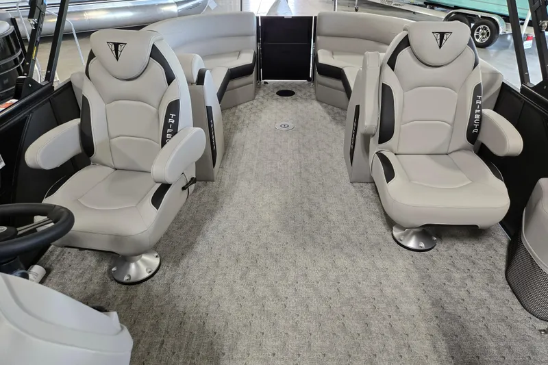 Slide: The Image of Luxurious interior of 2026 Trifecta 24RF LE 2.75 pontoon boat with plush seating. - 15