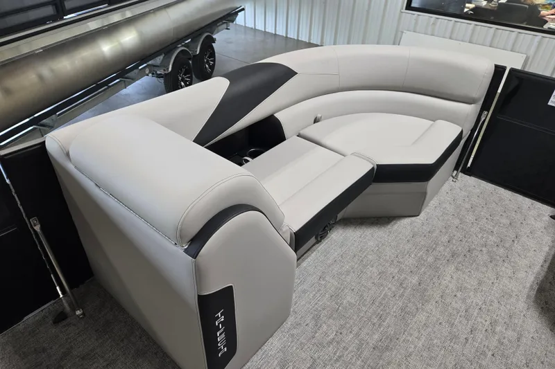 Slide: The Image of Luxurious seating on 2026 Trifecta 24RF LE 2.75 pontoon boat, featuring modern design and comfort. - 4