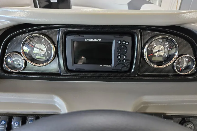 Slide: The Image of Dashboard of 2026 Trifecta 24RF LE 2.75 with gauges and Lowrance display. - 6