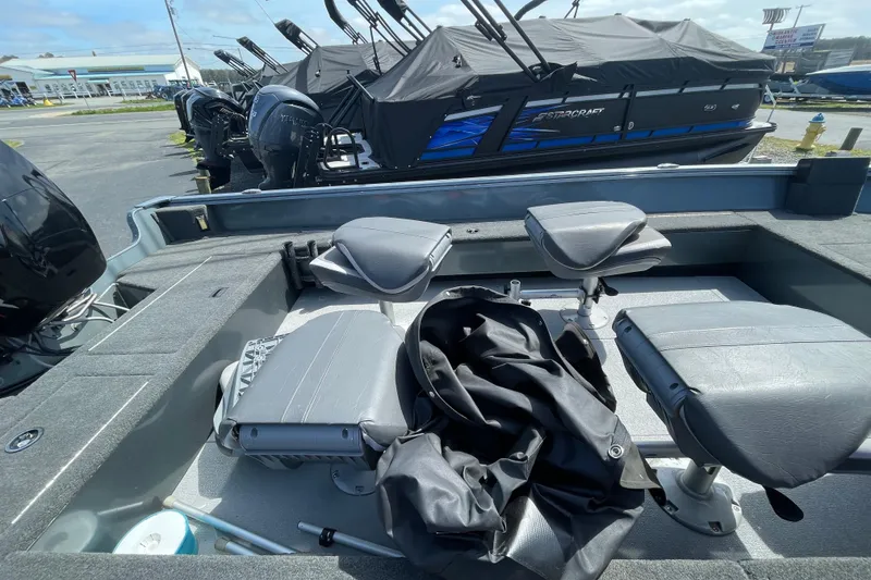 Slide: The Image of Interior of a 2023 Starcraft Storm 176 SC boat with seating and equipment. - 3