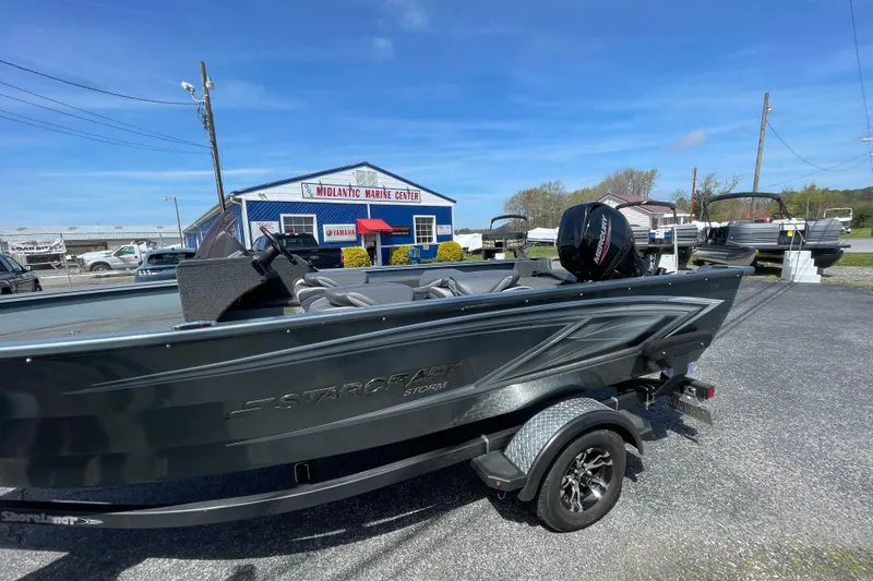 Slide: The Image of 2023 Starcraft Storm 176 SC boat at Midlantic Marine Center, featuring a Mercury engine. - 4