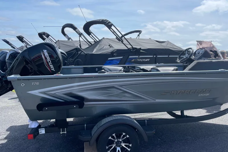 Slide: The Image of 2023 Starcraft Storm 176 SC boat with Mercury engine on trailer. - 5