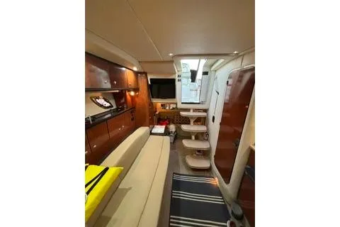 Slide: The Image of Interior of 2007 Sea Ray Sundancer 310 yacht with modern amenities and elegant design. - 16