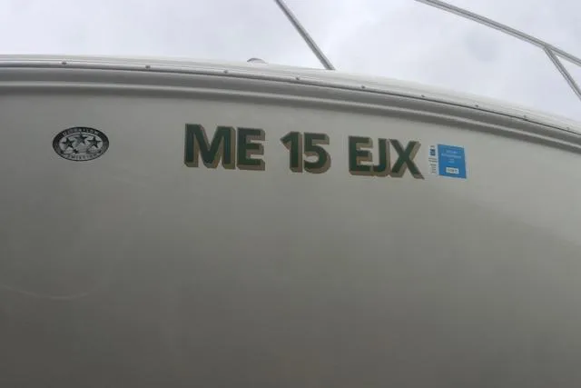 Slide: The Image of 2007 Sea Ray Sundancer 310 boat with registration "ME 15 EJX" on hull. - 33