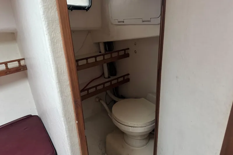 Slide: The Image of Compact marine bathroom inside a 2001 Eastern Lobsterman 27 boat. - 11