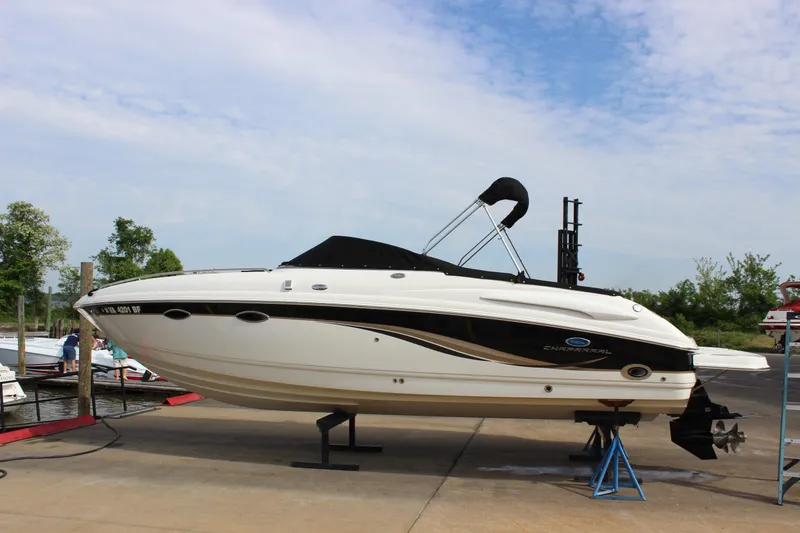 Slide: The Image of 2005 Chaparral 265 SSi boat on dry dock, ready for maintenance. - 3