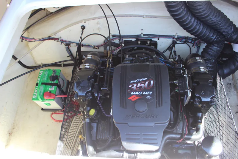 Slide: The Image of Engine compartment of 2005 Larson LXi 268 with MerCruiser 350 MAG MPI engine. - 10