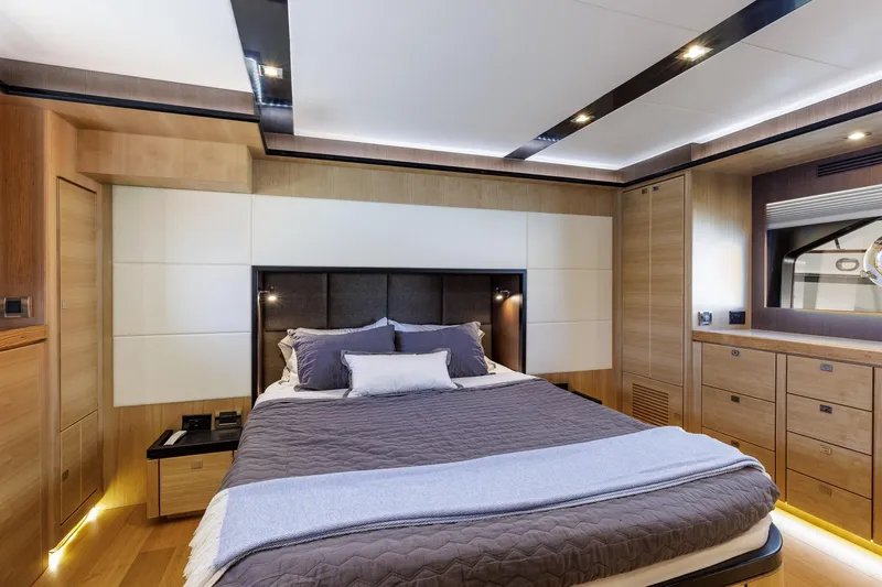 Slide: The Image of Luxurious bedroom interior of 2023 North Pacific 49 Euro yacht, featuring modern design and elegant furnishings. - 16