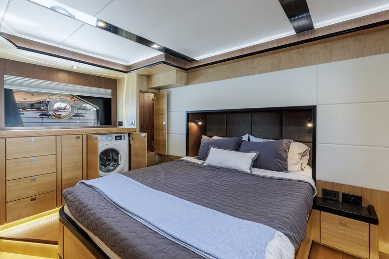 Slide: The Image of Luxurious bedroom interior of 2023 North Pacific 49 Euro yacht with modern amenities. - 17