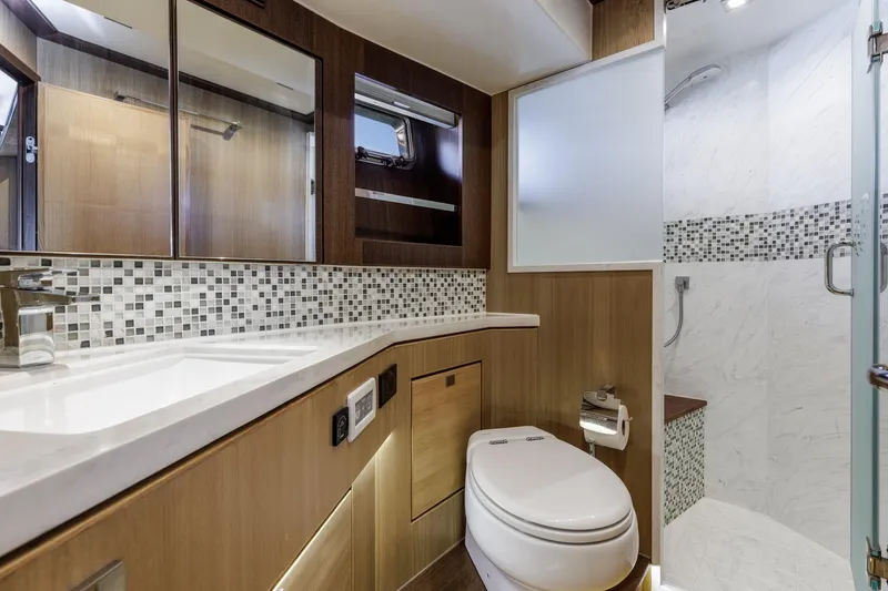 Slide: The Image of Luxurious bathroom in 2023 North Pacific 49 Euro yacht with modern fixtures and elegant design. - 19