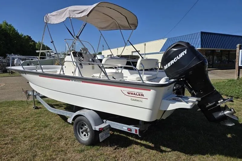 Slide: The Image of 2007 Boston Whaler 190 Montauk boat on trailer with Mercury outboard motor. - 3